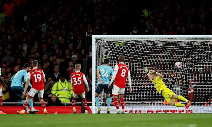 Southampton defender Duje Caleta-Car pictured (left) scoring a goal during his team's away game at Arsenal in April 2023